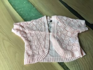 Bolero en tricot rose. 🤩