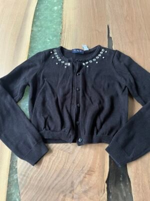 Veste noire avec perles et pierres
10-12 ou G