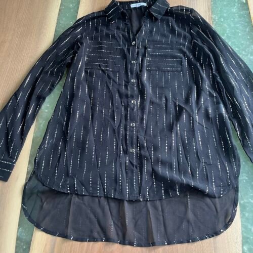 Blouse noire et argent.  P
