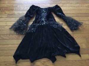 Enfant one size sorcière (semble 6-8 ans)