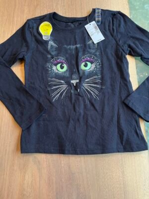 Chandail de chat noir - Qui brille dans le noir. Neuf TP ou 4 ans