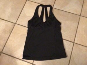 Très belle camisole REEBOK x small mais peut faire small /avec soutient
