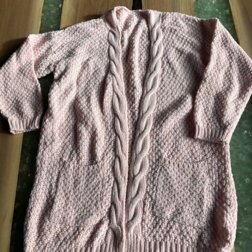Belle veste de tricot rose 💖
Semble P