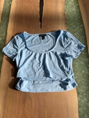 Top bleu poudré TG mais semble G
