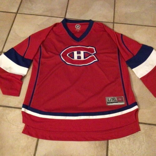 Jersey du Canadiens large/xlarge ❤️/ le blanc est un peu taché mais super beau quand même!  Junior