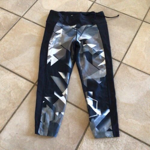 UNDER ARMOUR small / compression/ une petite poche zippée