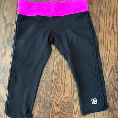 Legging 3/4 joshua Perets small
Pochette en arrière