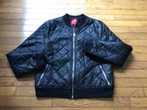 GUESS superbe blouson noir large/ très belle qualité