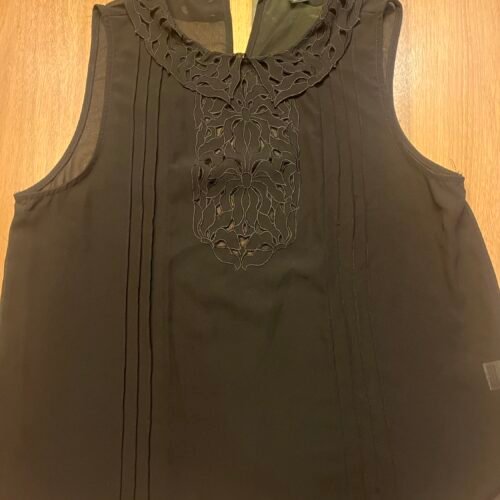Camisole noire très chic M
Icône. Transparente