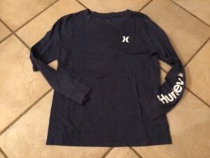 Hurley 14-16 2-3 petites taches blanches dans le haut mais partiront au lavage