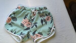 short fleurie turquoise gr 6