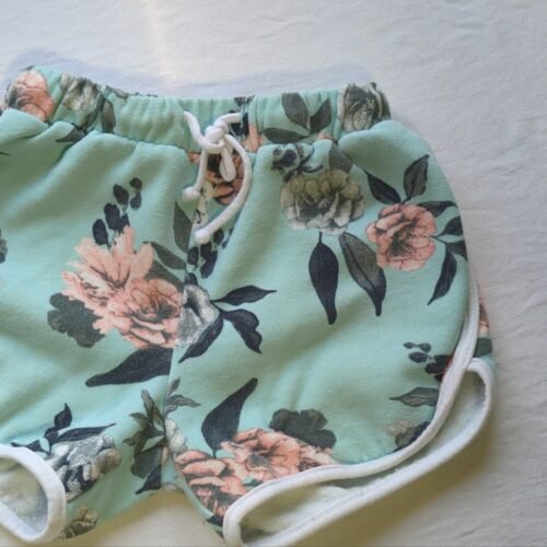 short fleurie turquoise gr 6