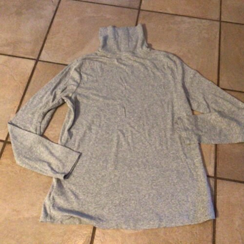 dcbdb399-4412-46d4-91ce-0d20269120bf-6717-000001f91410cdad_file Col roulé mince/ semble médium