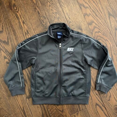 Veste grise Nike 7 ans