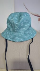 Beau chapeau dinosaures 🦕 réversible, gr medium